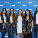 Rowan O&rsquo;Connell-Gates with fellow Global Affairs student employees celebrating graduation. Liz McAllister/UC Davis