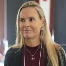 Woman scientist with long blonde hair, headshot