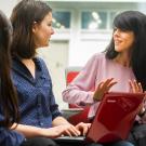 Engineering professor, right, explains to her two female graduate students.