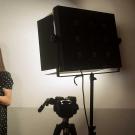 Female student with cinematography equipment