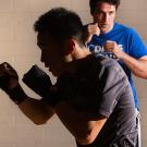 Two men shadow boxing