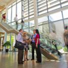 students walking through gallagher hall at UC Davis' graduate school of management