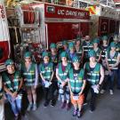 Group photo alongside firetruck