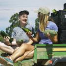 Two female students with produce