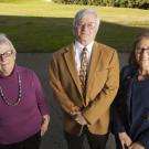 Photo: Faculty members, posing outside, in a line