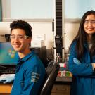 Two award winners in a science lab