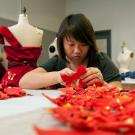 A student designs a dress