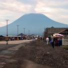 Residents walk an unpaved road in eastern Democratic Republic of Congo