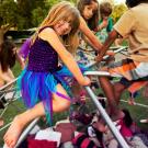 Children climb on a dome during the Whole Earth Festival.