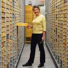 Photo: Lynn Kimsey amid specimen drawers.