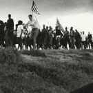 John Lewis with historic march in background