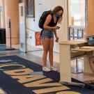 Students line up to enter the library.