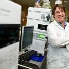 Oliver Fiehn standing in lab with equipment.