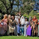 Students dressed as mythical gods and goddesses in costumes from the Department of Theatre and Dance.