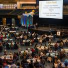 Soaring to New Heights scene-setter: people at round tables in The Pavilion at the ARC.