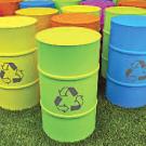 Photo: barrels with recycle symbol
