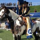 Tatum Burris on a horse at the football game.