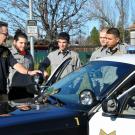 Officer Tim Hunter talks to a group of cadets in 2013.