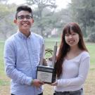 Photo: Two students hold the Causeway Classic Blood Drive perpetual trophy.