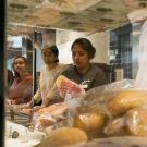 Students practice making sandwiches.