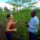 Prof. Waterman in Moringa field with man