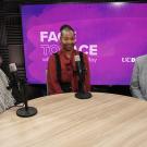 Three smiling people seated at a round podcast table with microphones and purple backdrop