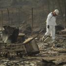 Soldier from National Guard walks through aftermath of Camp Fire in Paradise, California in 2018