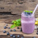 UC Davis researchers find that the right combination of blending fruits can give your body a nutritional boost. Photo shows banana and blueberry smoothie. (Getty)