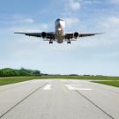 Airplane lands on runway