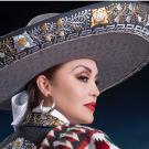 Aida Cuevas, woman in decorative hat and costume, upcoming event at Mondavi Center