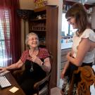 A mother and daughter in their living room