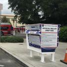 "Official Ballot Drop Box," foreground, Unitrans bus behind