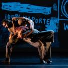 Dancers on dark stage