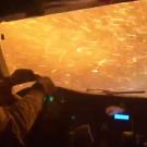 Firefighter drives truck inside firestorm.