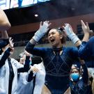 Gymnast celebrates after routine