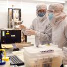 Two researchers in clean room lab