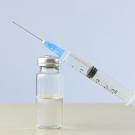 Syringe and vial of vaccine