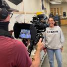 Twins laugh as they're being filmed for The College Tour