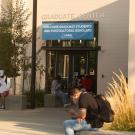 Students in front of entrance to the Graduate Center at Walker hall