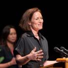 Leigh Ann Simmons, UC Davis faculty, speaking at podium