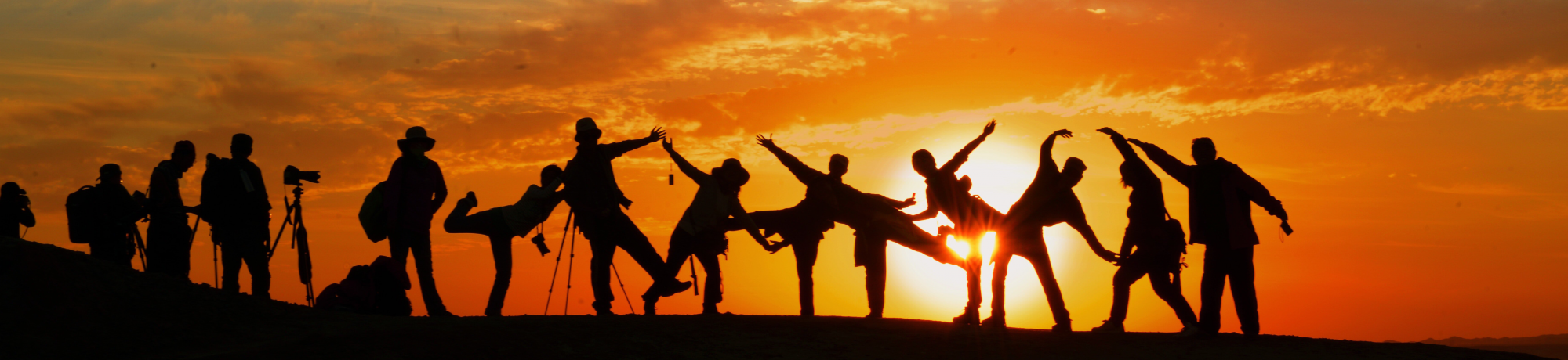 uc davis community development students stand in shadows at sunset