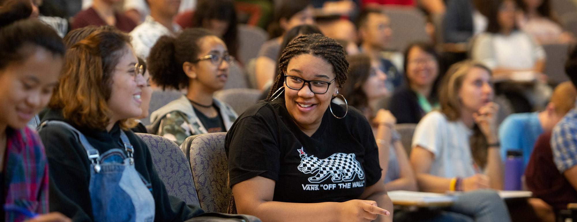 students gathered in a lecture hall