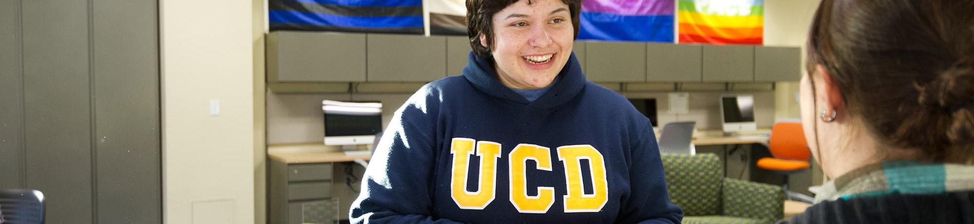 A female student smiles for the camera