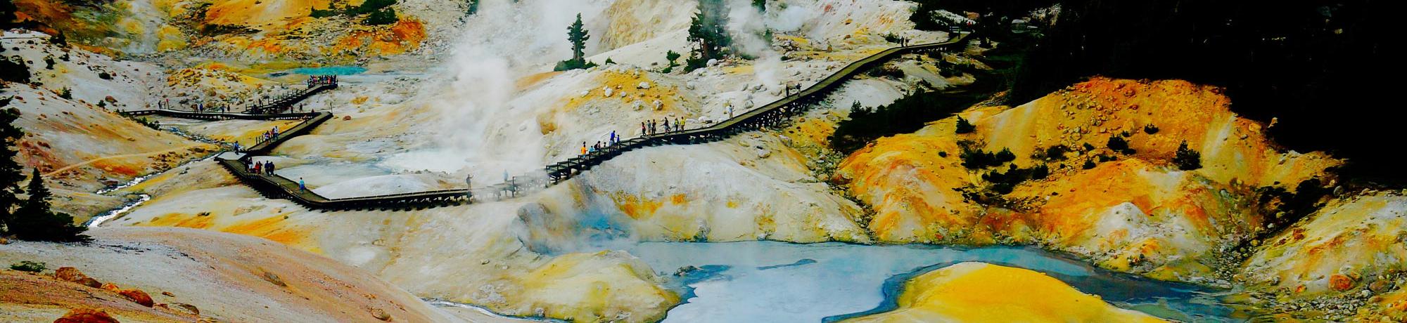 A crowd walking through a geothermal area in Lassen Volcanic National Park