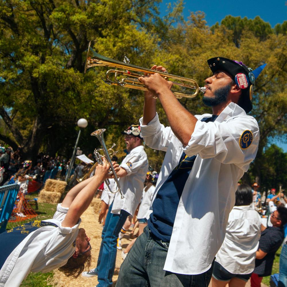 students performing outside in the marching band for Picnic Day Battle of the Marching Bands