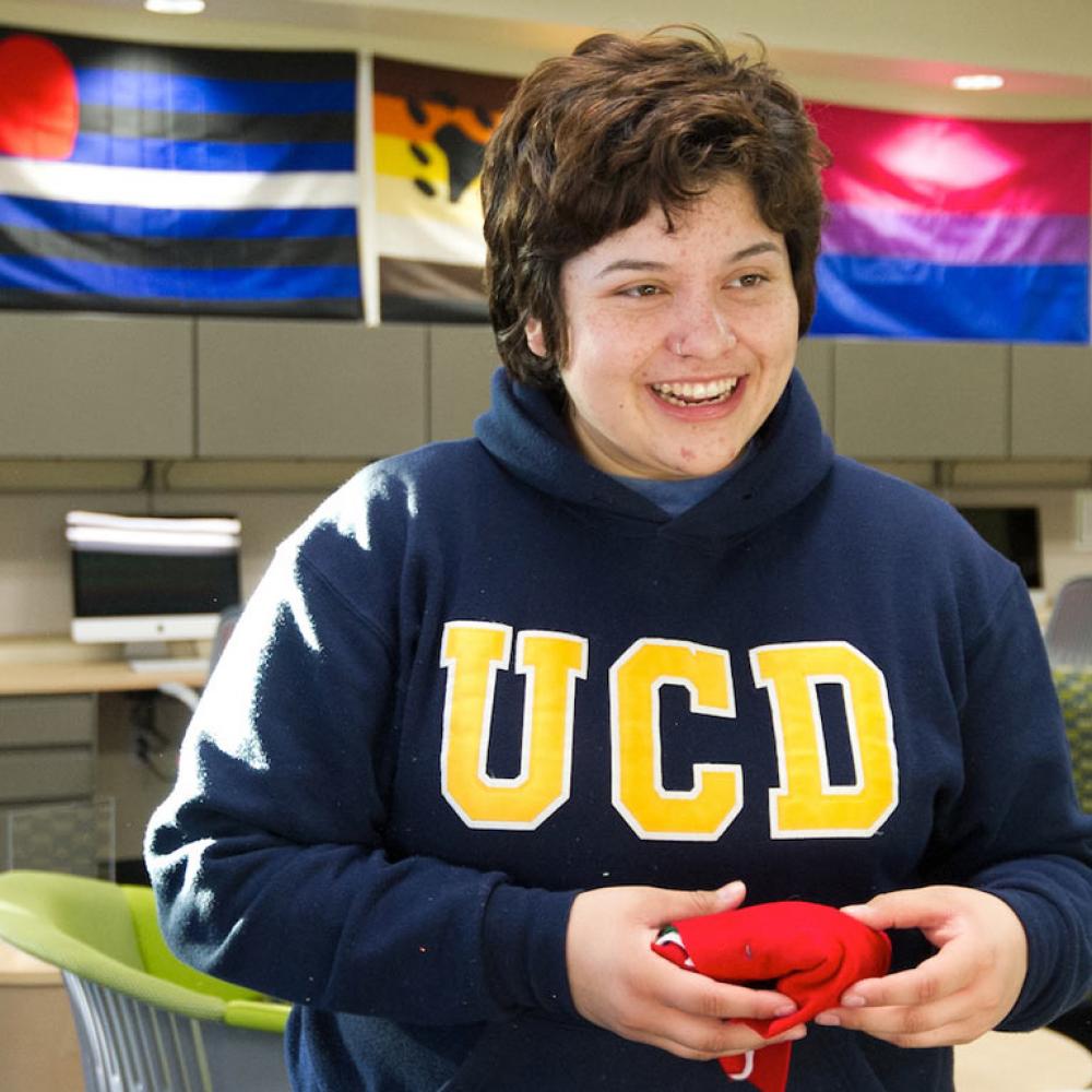 A female student smiles for the camera