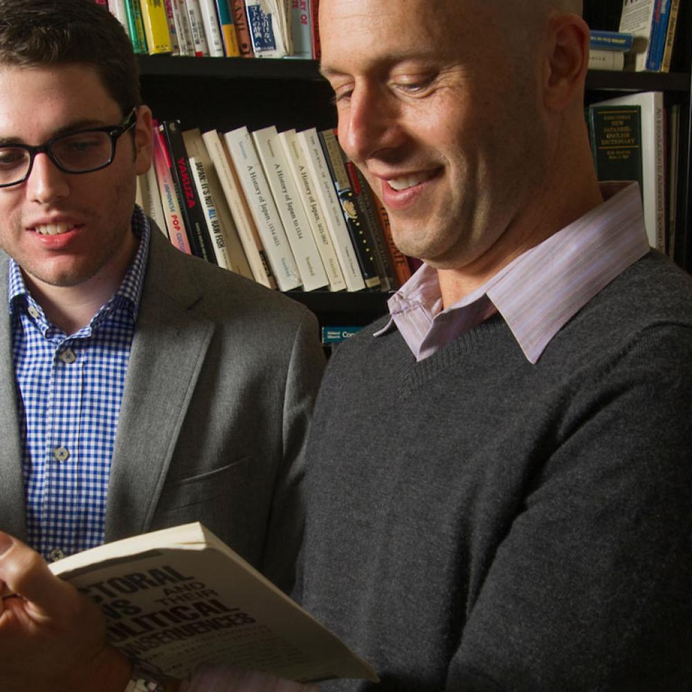 A student and a professor discuss a political science book