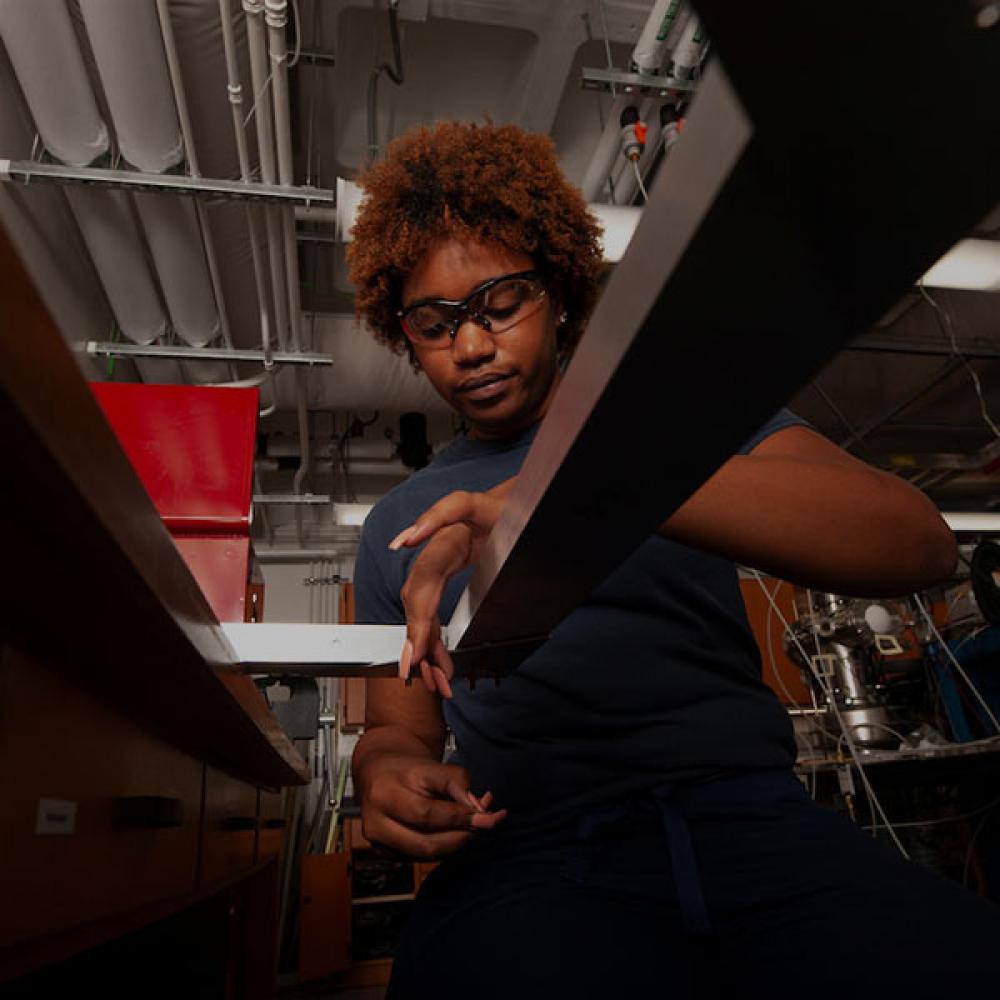 A female student working in a materials lab