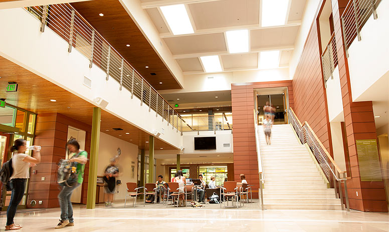 Building with skylights and people walking through