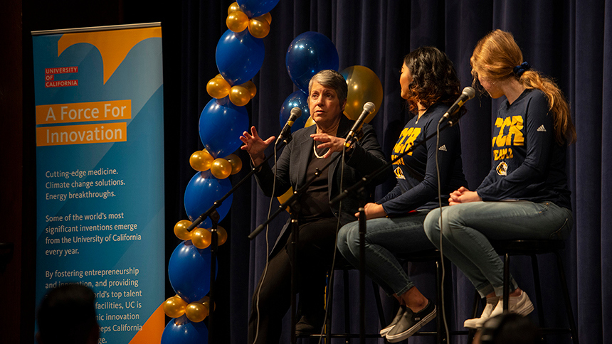 Janet Napolitano at the mike during the podcast